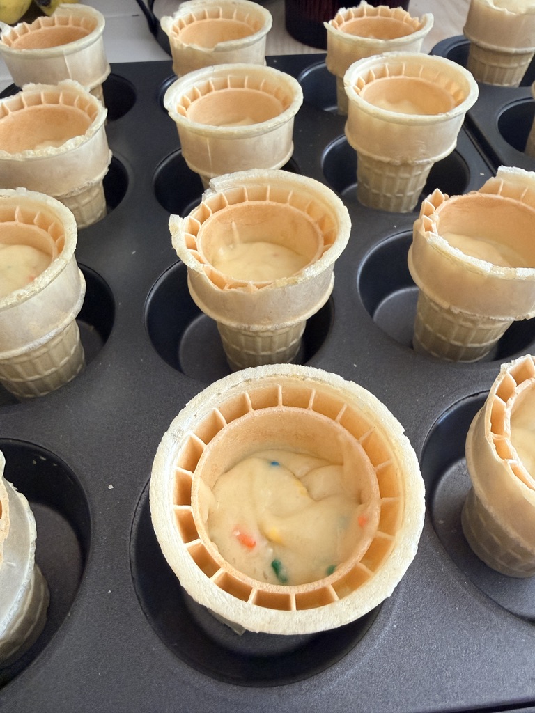 cake cones with cupcake batter